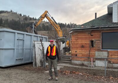 Robert in front of old house